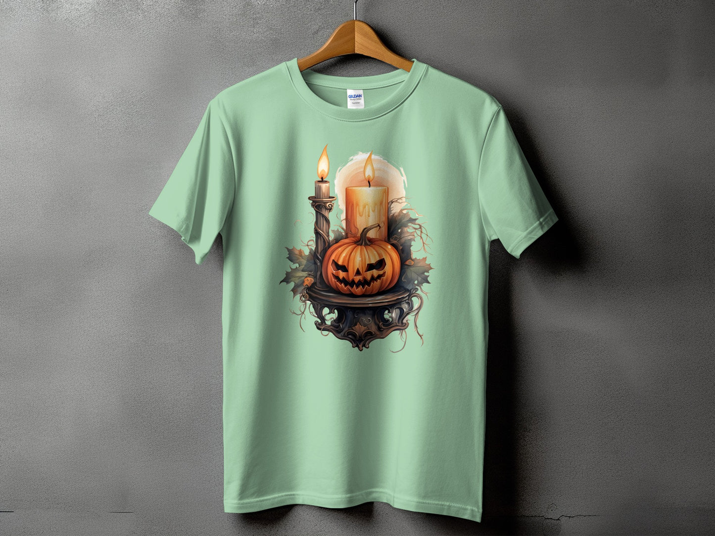 T-shirt with a Halloween graphic featuring a carved pumpkin and lit candles.