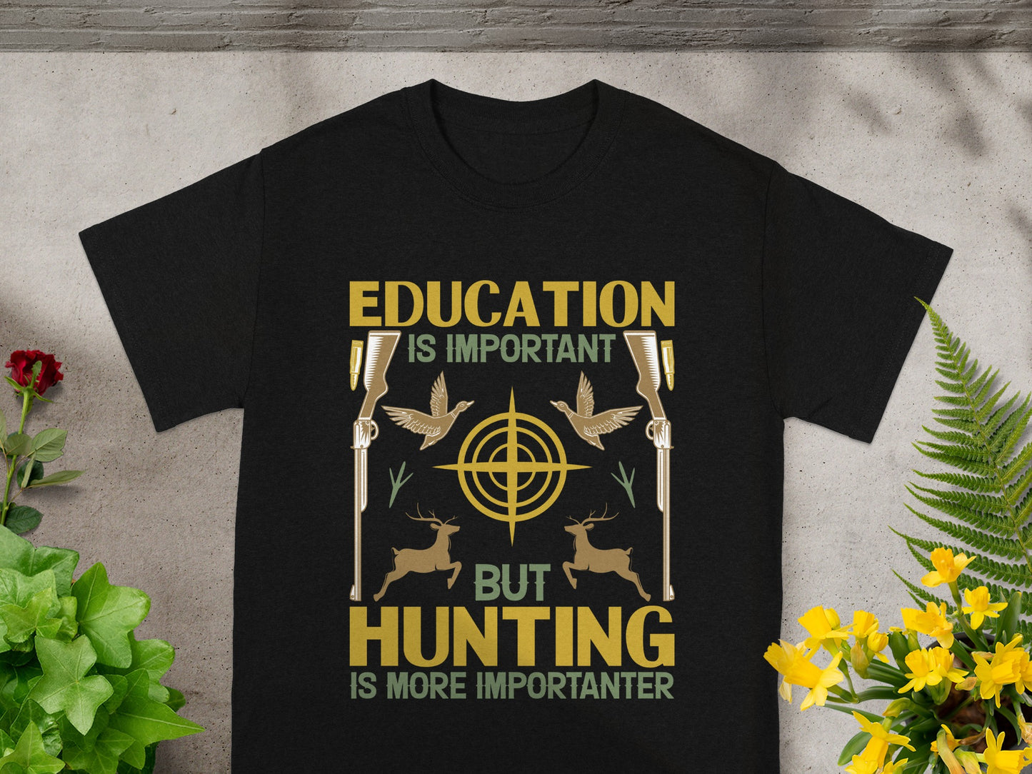 Black t-shirt with "Education is Important But Hunting is More Importanter" text and hunting graphics.