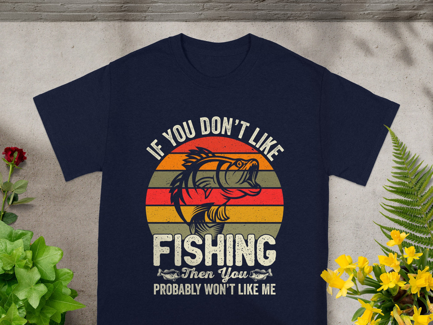 Navy t-shirt with "If you don't like fishing, then you probably won't like me" text and fish graphic.