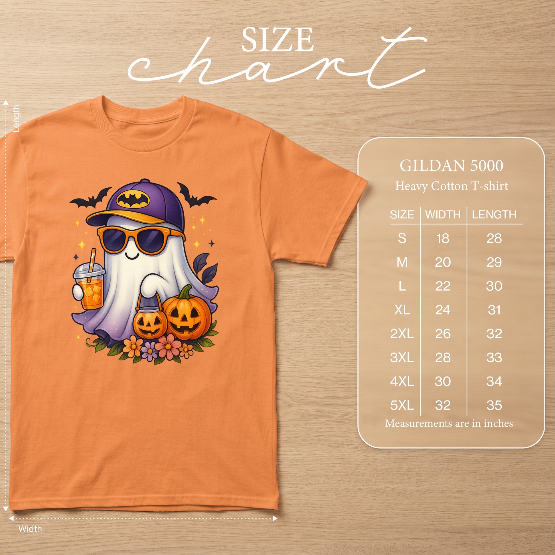 Orange t-shirt with a cute ghost wearing sunglasses, a Batman hat, and holding a drink, with pumpkins and flowers. Size chart included.