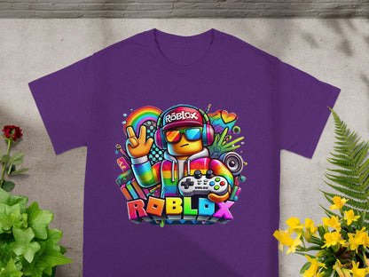 Purple t-shirt with colorful Roblox gamer graphic featuring a character and controller.