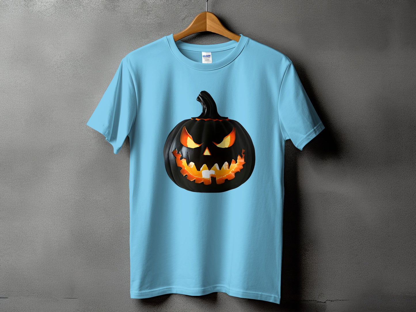 Light blue t-shirt with a black jack-o'-lantern graphic.