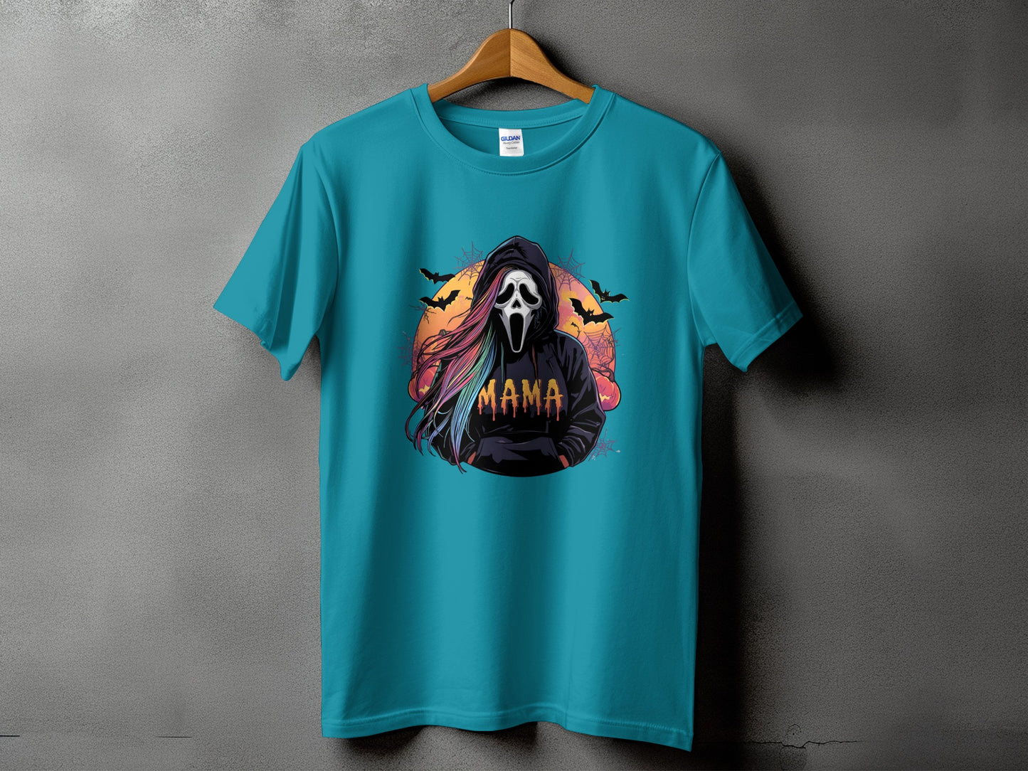 Teal t-shirt with Ghostface mask and "Mama" text with rainbow hair.