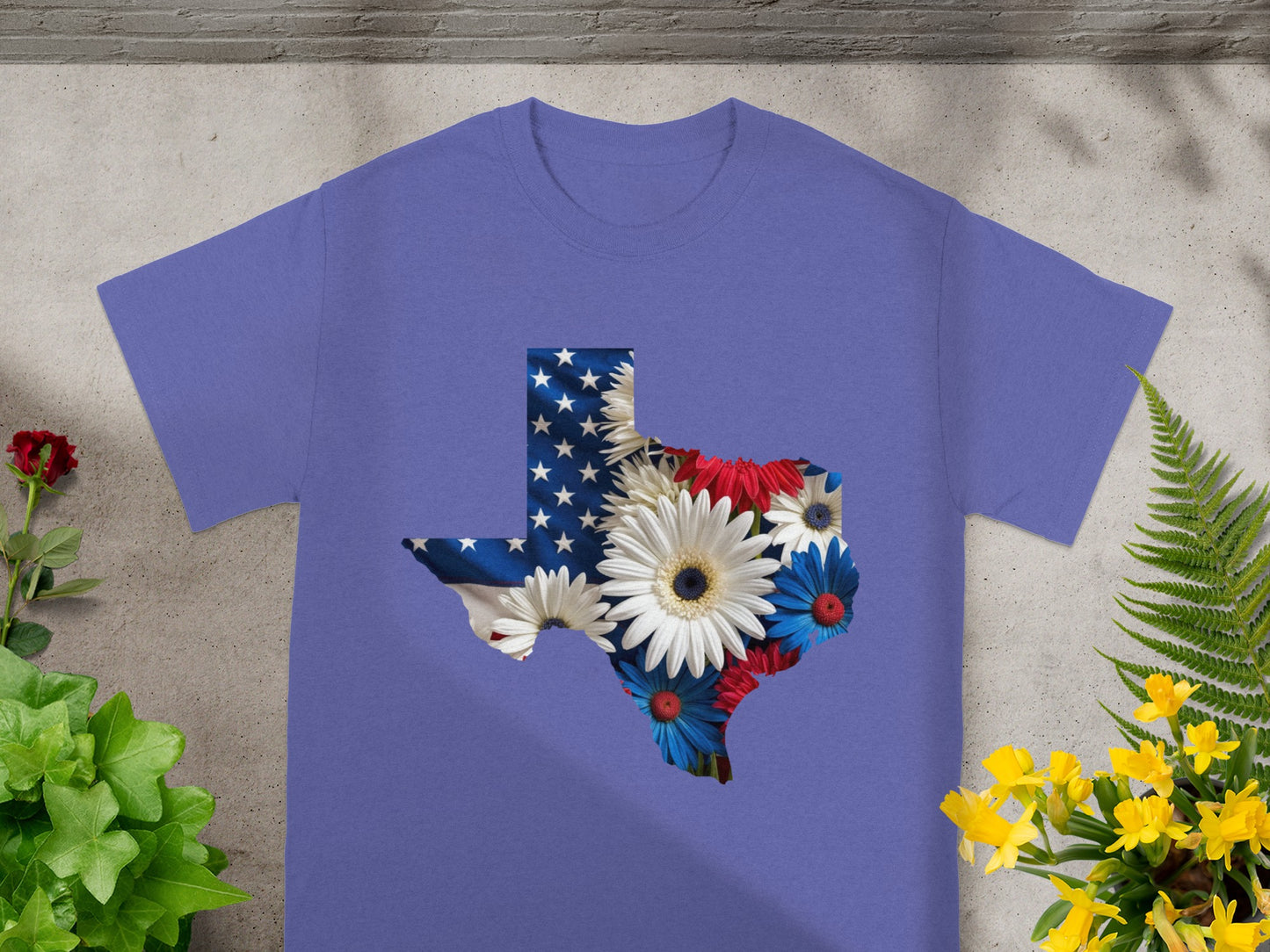 Texas outline t-shirt with American flag and patriotic flowers design.