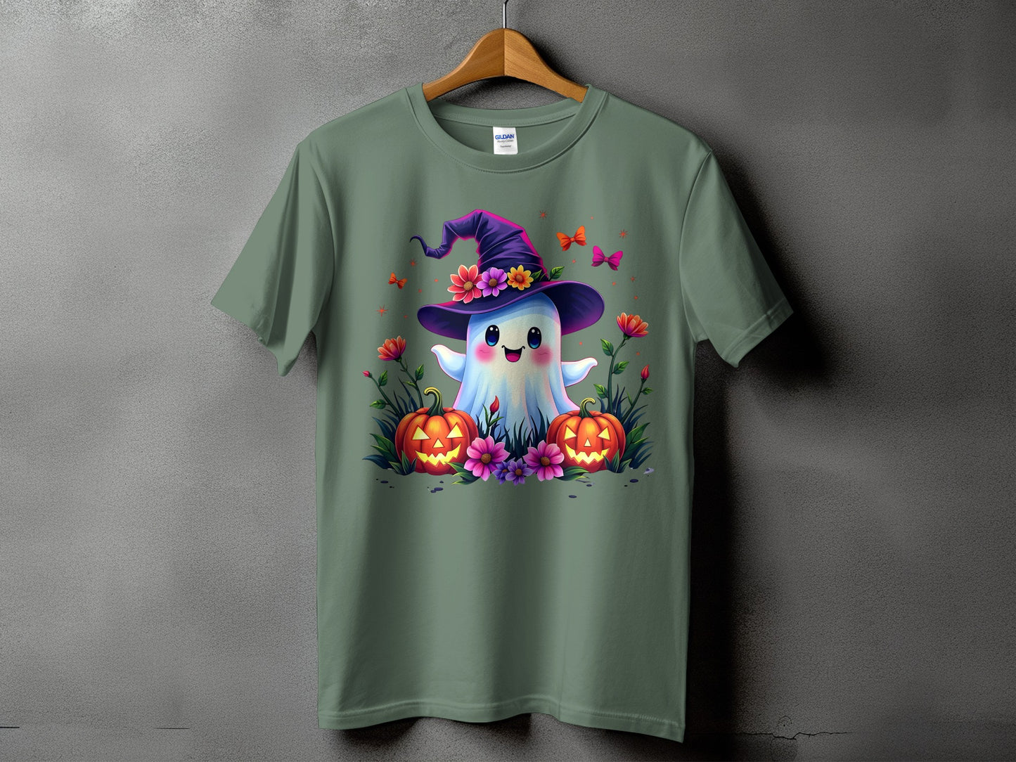 Cute ghost wearing witch hat with pumpkins and flowers.