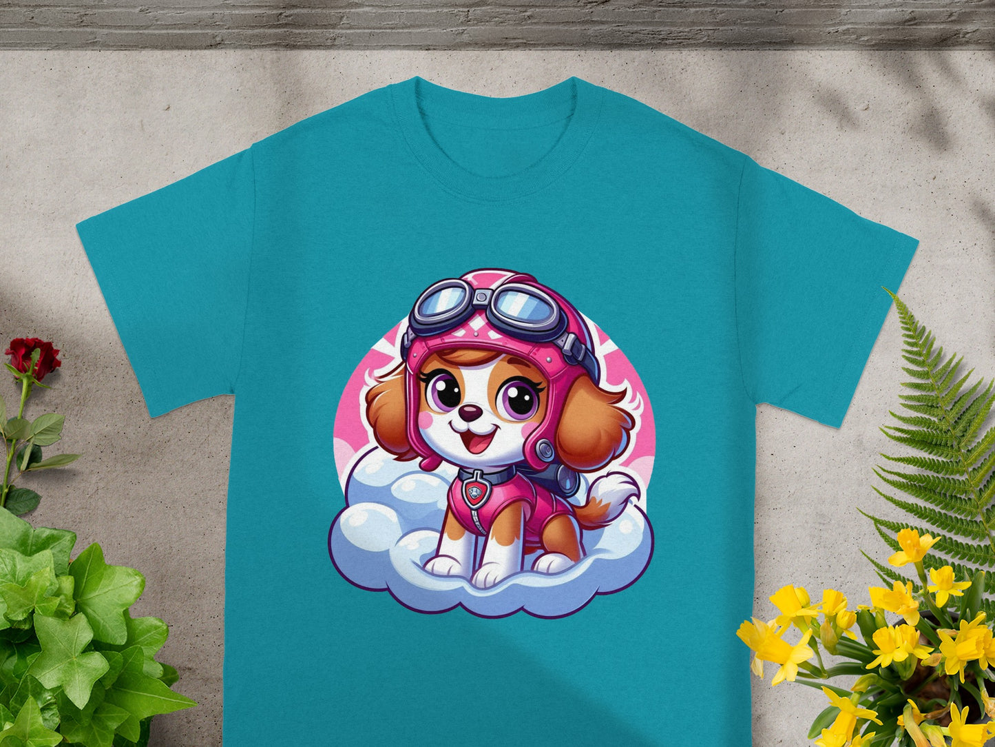 Paw Patrol Skye on a cloud wearing pink goggles and helmet, teal t-shirt.