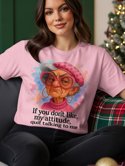 Pink t-shirt with illustration of a grumpy elderly woman and text.
