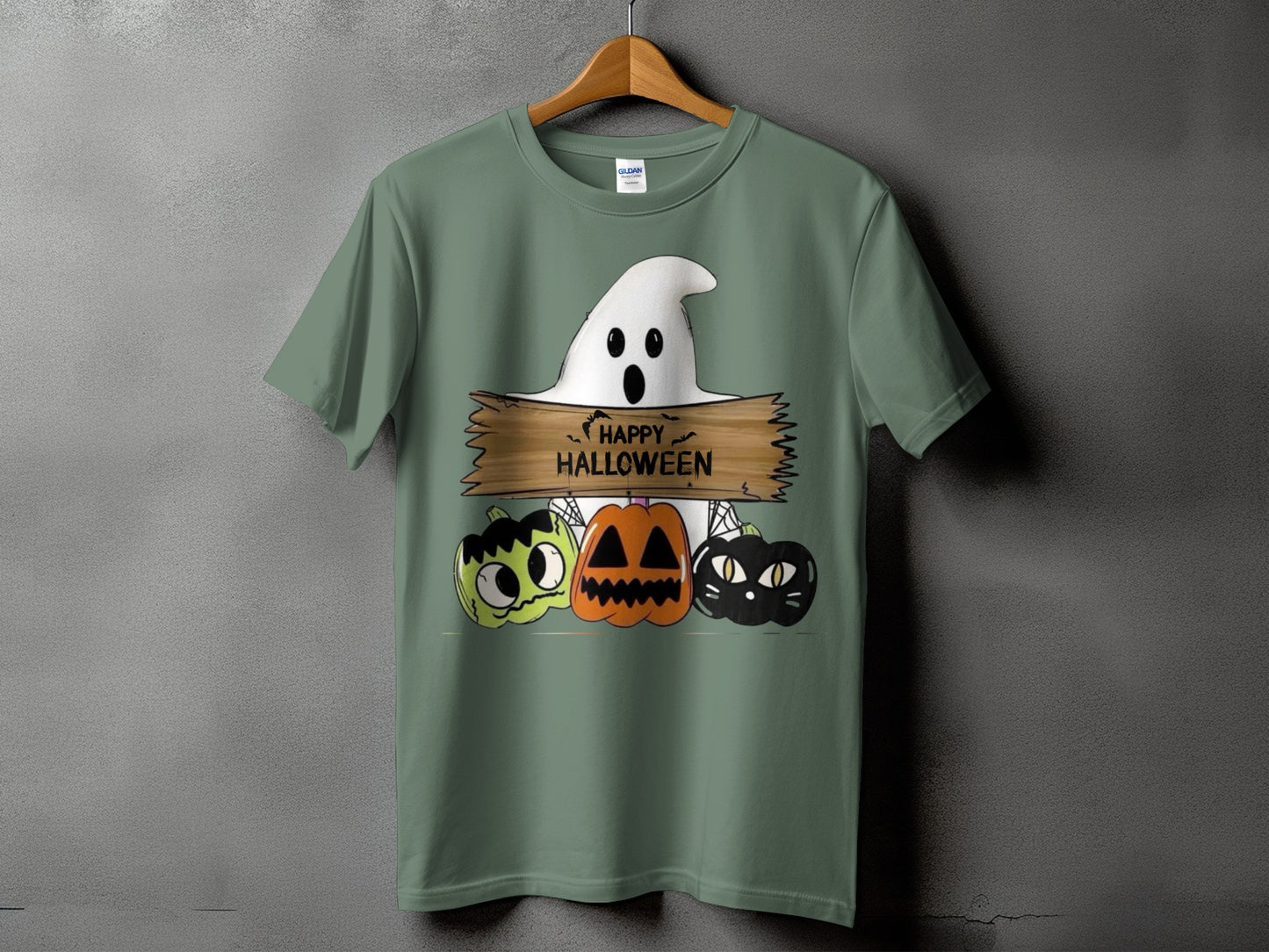 Green t-shirt with a ghost and pumpkins graphic that says "Happy Halloween."