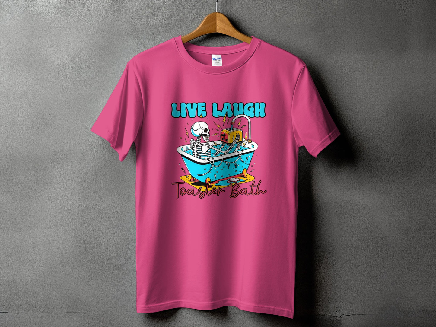 Pink t-shirt with skeleton in bathtub and text "LIVE LAUGH Toaster Bath".