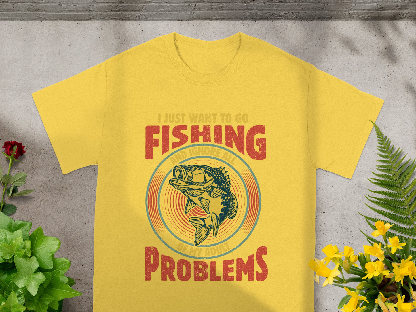 Yellow t-shirt with fishing graphic and text: "I Just Want to Go Fishing and Ignore All of My Adult Problems".