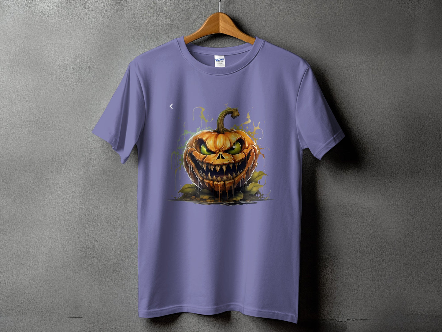 Purple t-shirt with a scary jack-o'-lantern graphic and colorful splashes.