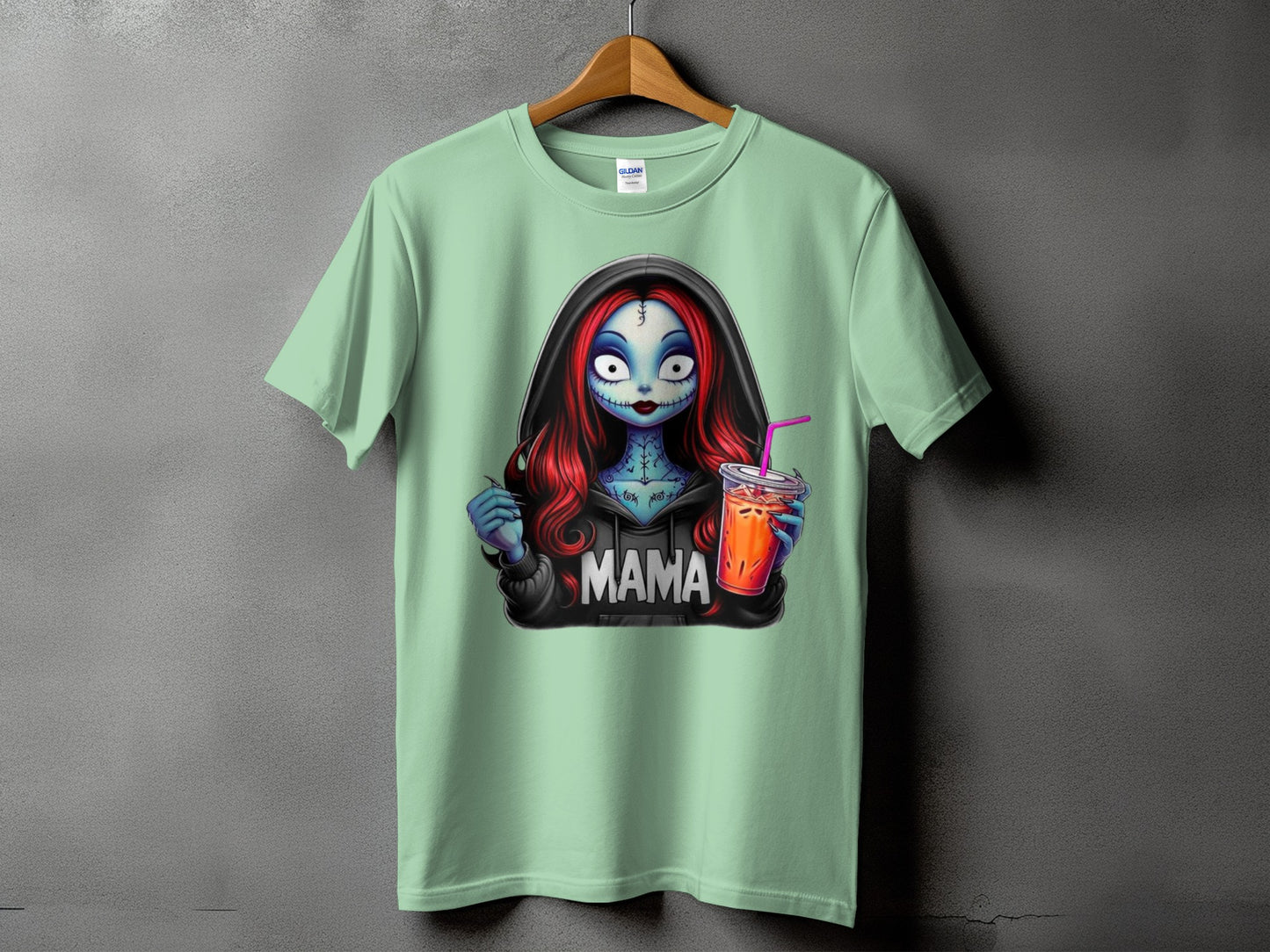 T-shirt with graphic of Sally from The Nightmare Before Christmas holding a drink.