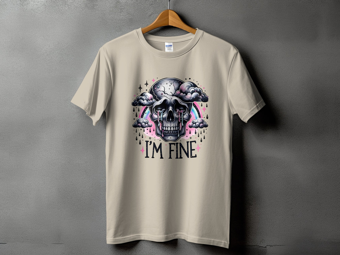 T-shirt with crying skull, clouds, rainbow, stars, and text "I'M FINE."