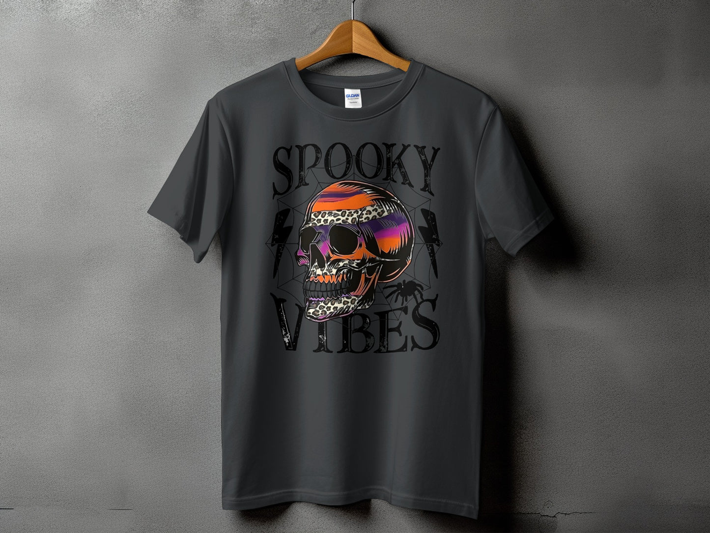 Dark gray t-shirt with "Spooky Vibes" text and a colorful, patterned skull graphic.