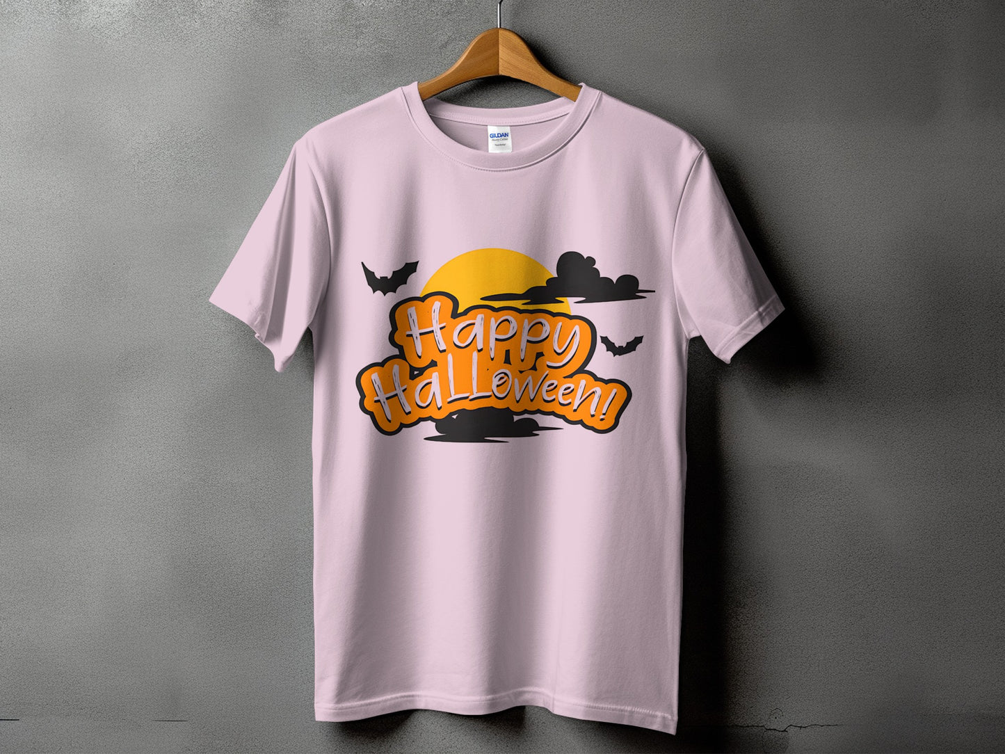 Pink t-shirt with "Happy Halloween!" text and spooky graphics.