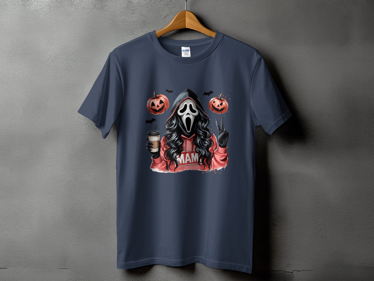 Ghostface character with coffee, pumpkins, bats, and "MAM" text on t-shirt.