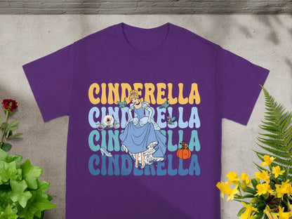 Purple t-shirt with Cinderella graphic and text, featuring the character and pumpkin.