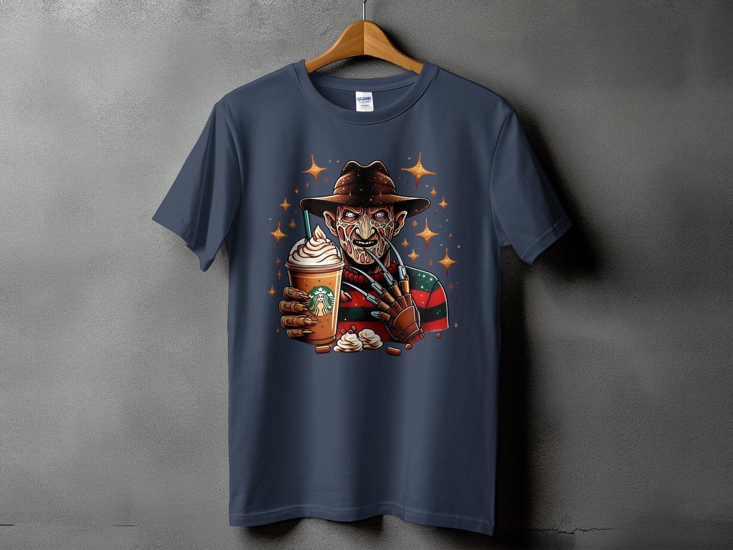 T-shirt graphic of Freddy Krueger holding a Starbucks Frappuccino with stars.
