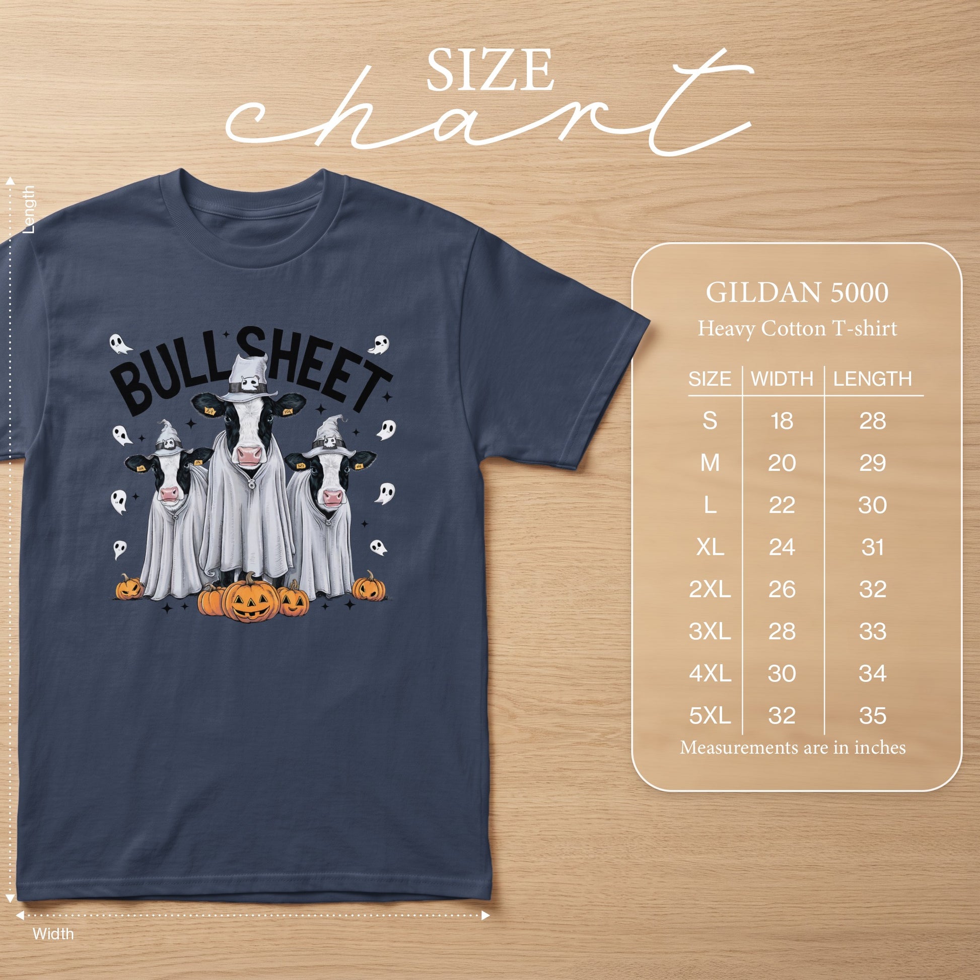 Dark blue t-shirt with "BULL SHEET" graphic featuring cows in ghost costumes and pumpkins. Size chart included.