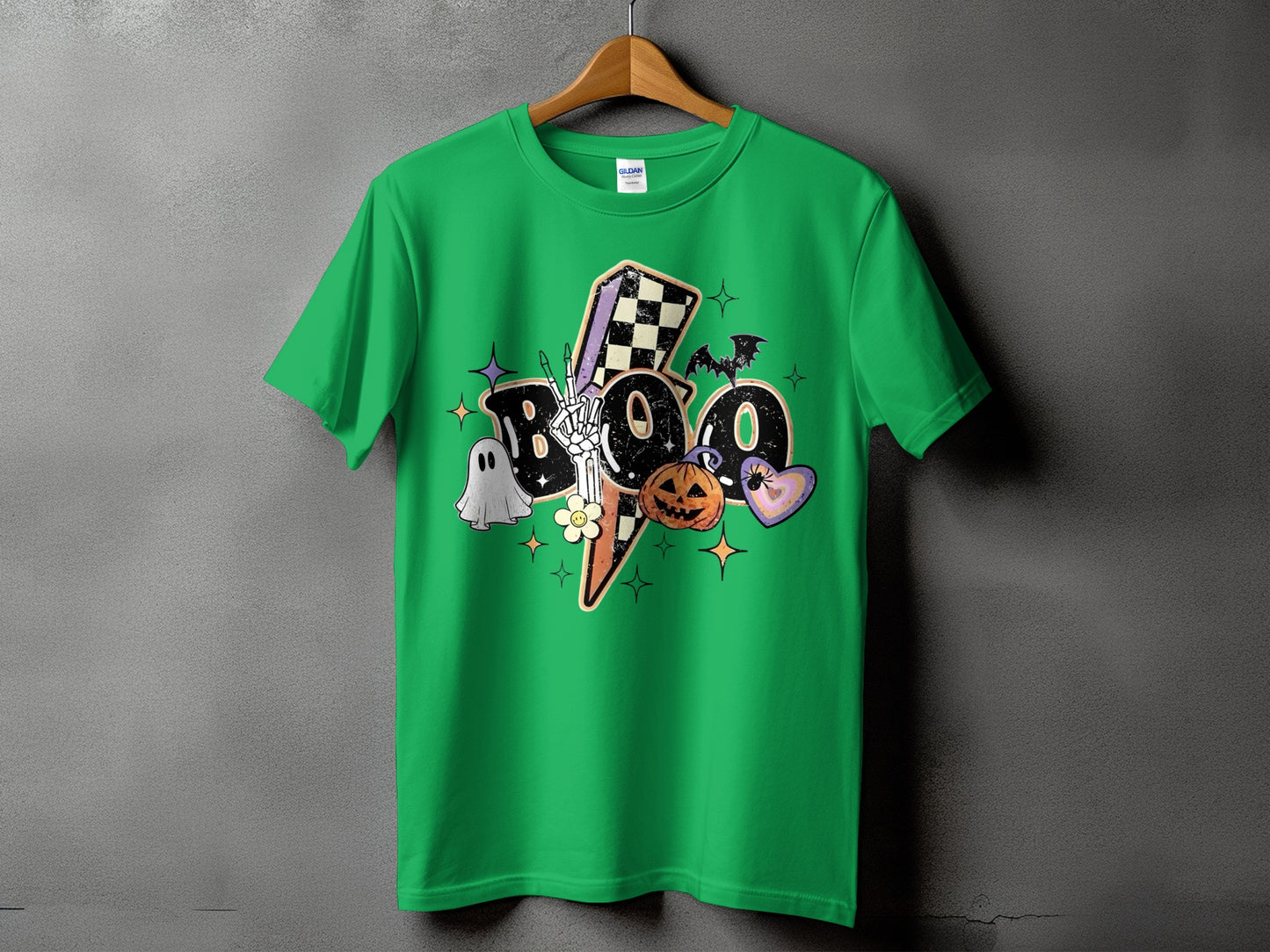 Green t-shirt with a "Boo" graphic featuring Halloween elements and a lightning bolt.