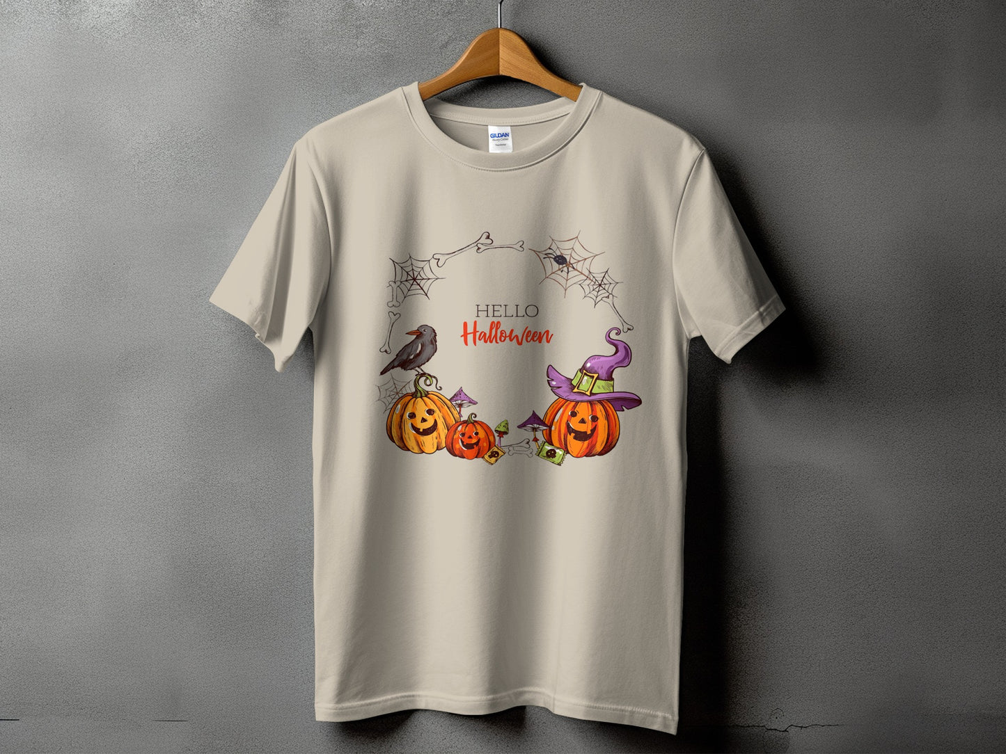 T-shirt with Halloween pumpkins, crow, witch hat, spiders, and text "HELLO Halloween".
