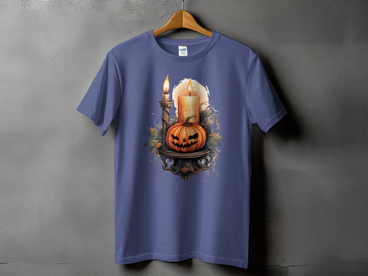 T-shirt featuring a Halloween-themed graphic of a carved pumpkin and two lit candles.