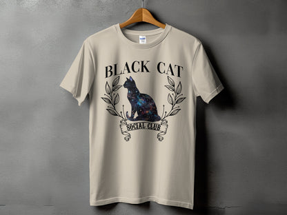Light beige t-shirt with "BLACK CAT SOCIAL CLUB" text and galaxy cat graphic.