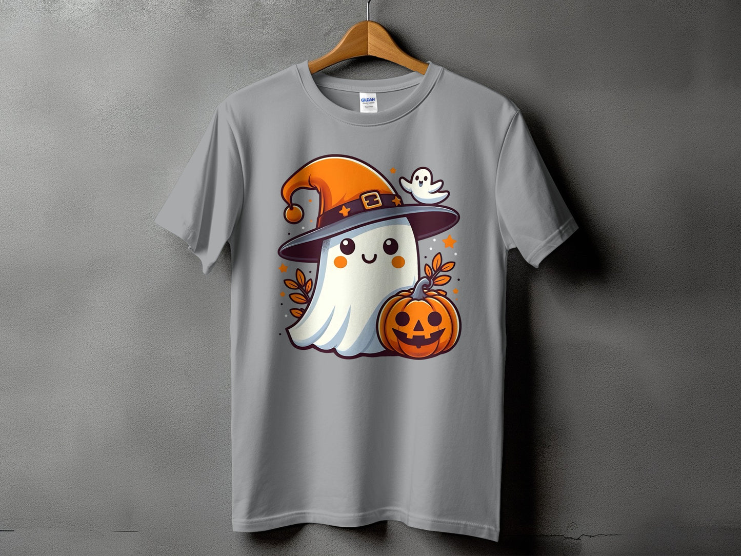 T-shirt with cartoon ghost wearing a witch hat and holding a pumpkin.