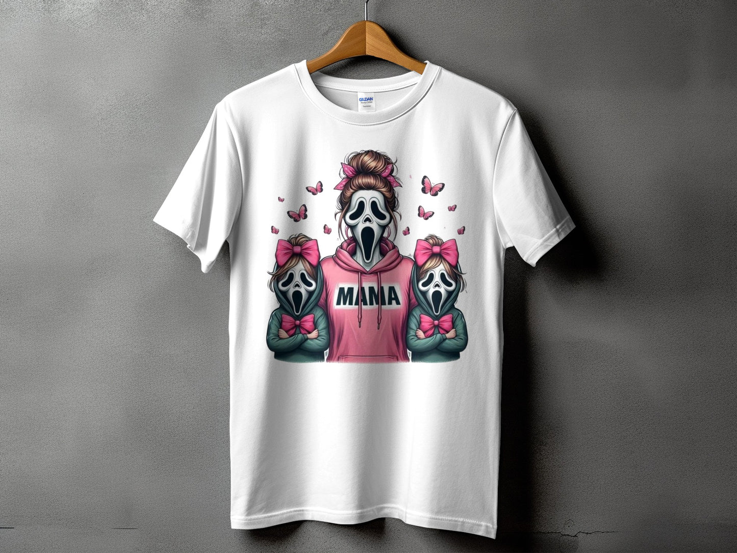 White t-shirt with a graphic of a masked person with "MAMA" text and two smaller masked figures.