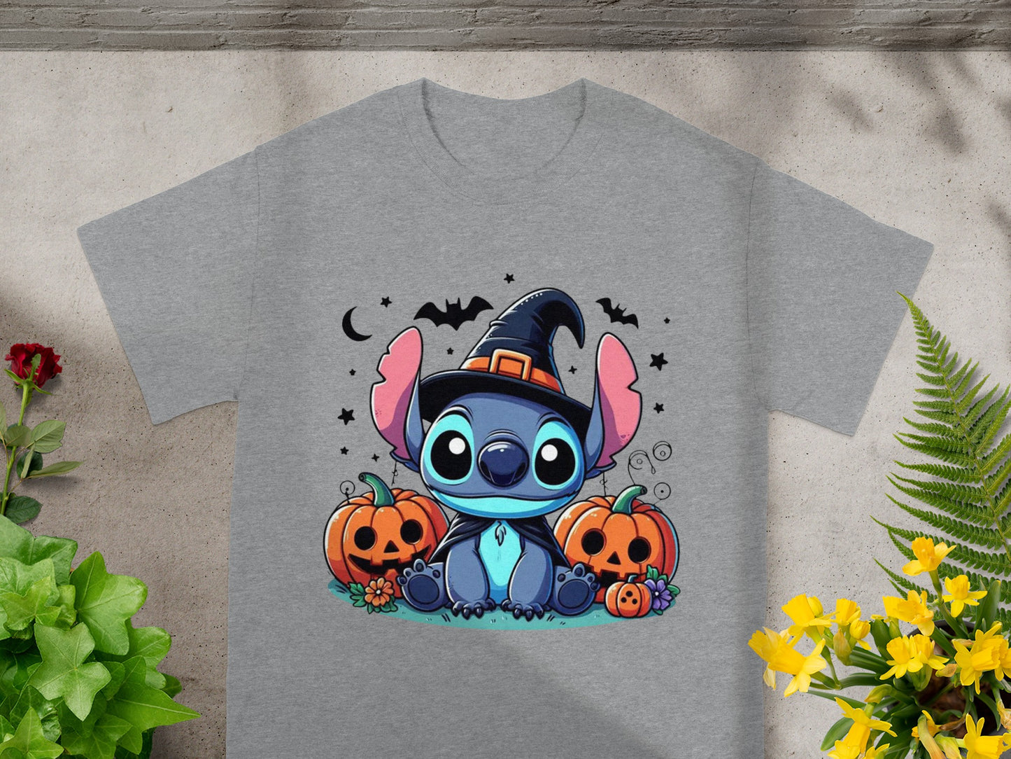 Stitch in a witch hat with pumpkins and bats for Halloween.