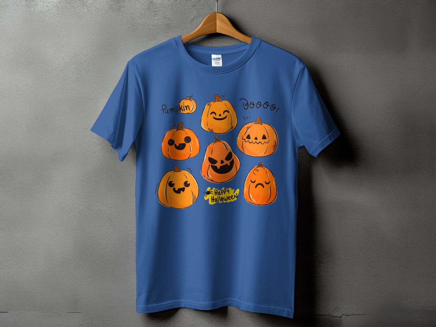Blue t-shirt with a cartoon illustration of several pumpkins and "Happy Halloween" text.