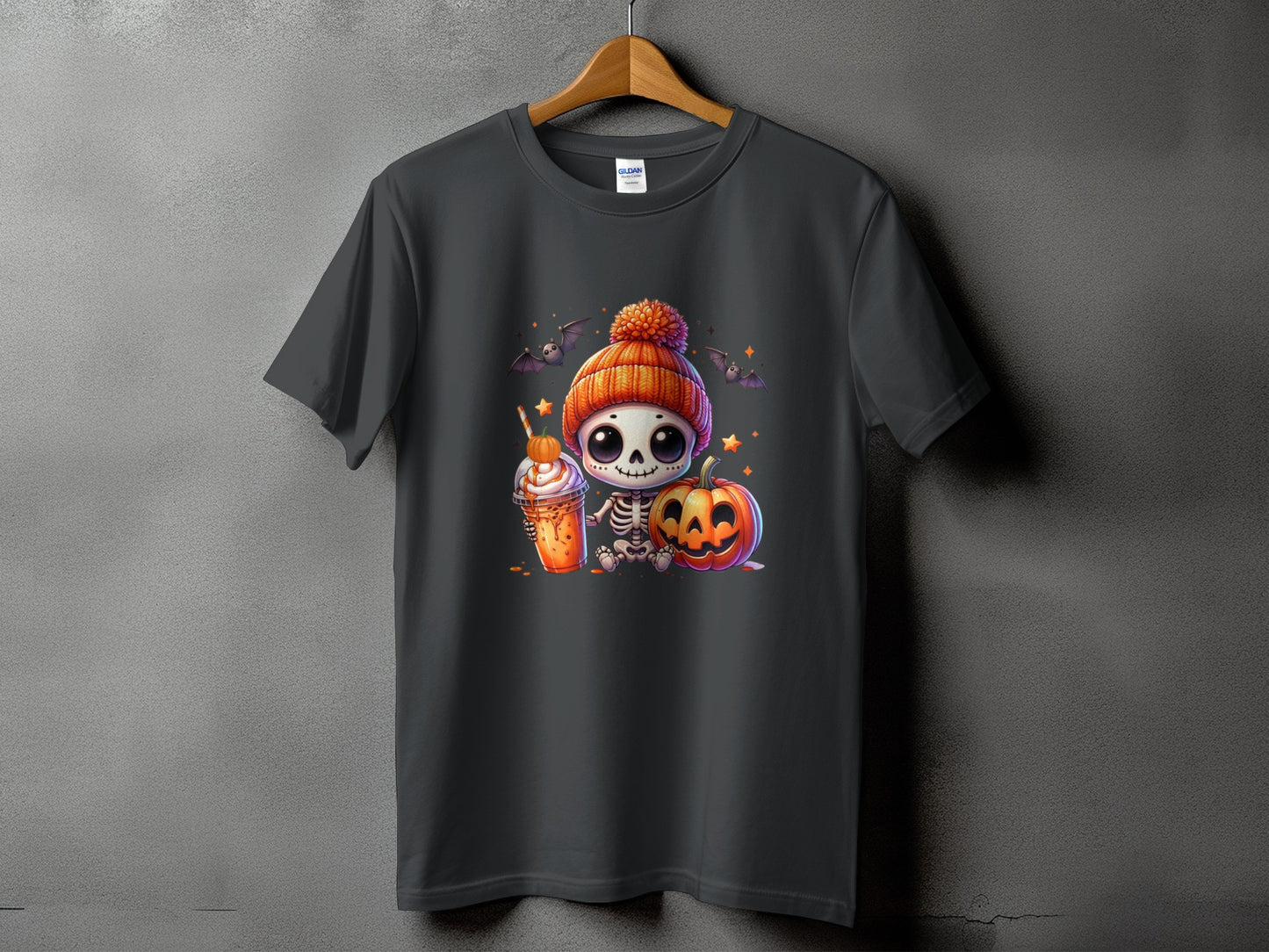 Dark grey t-shirt with cartoon skeleton, pumpkin, and drink graphic.