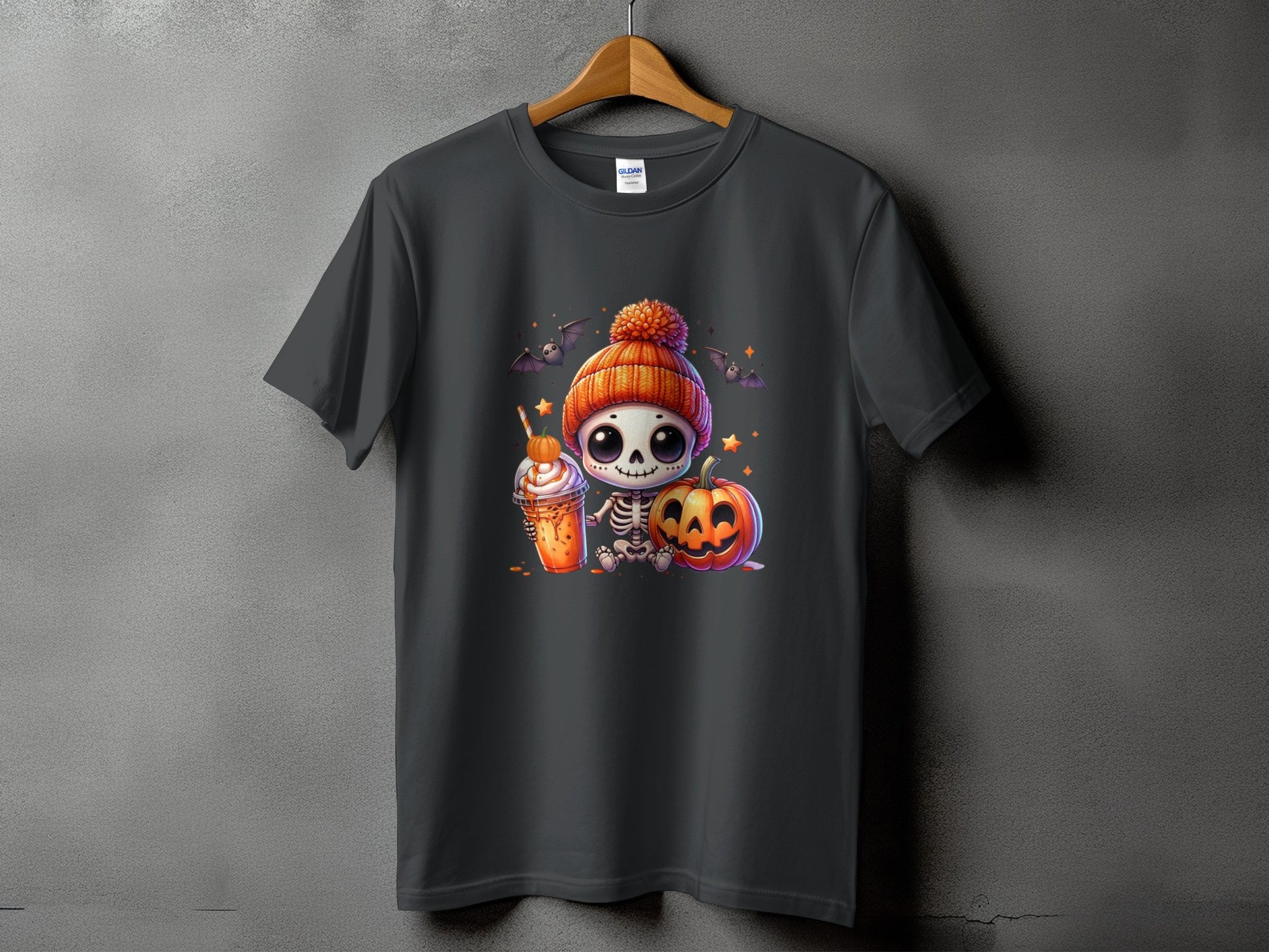 Dark grey t-shirt with cartoon skeleton, pumpkin, and drink graphic.