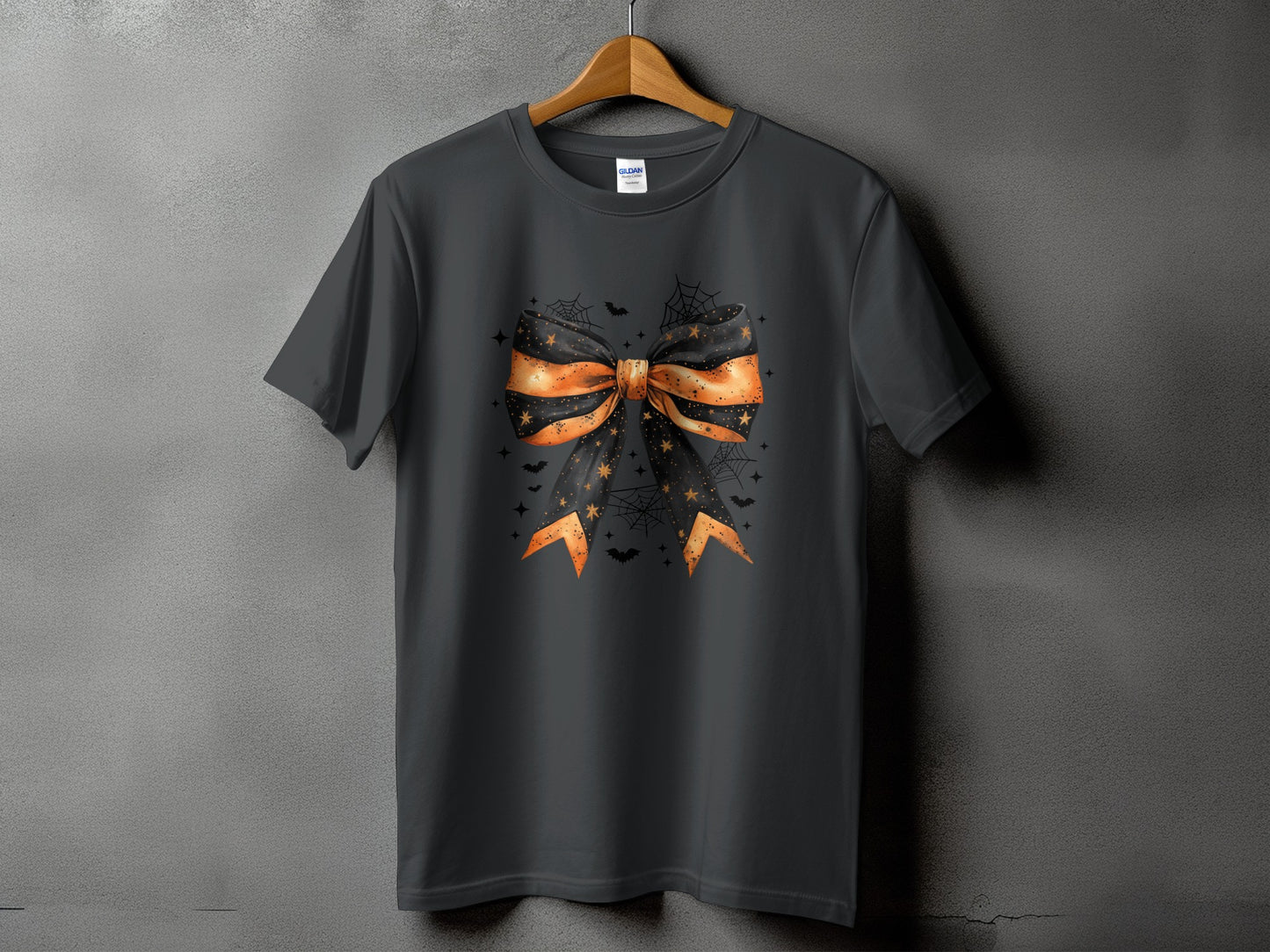 Dark grey t-shirt featuring a Halloween bow with bats and spiderwebs.
