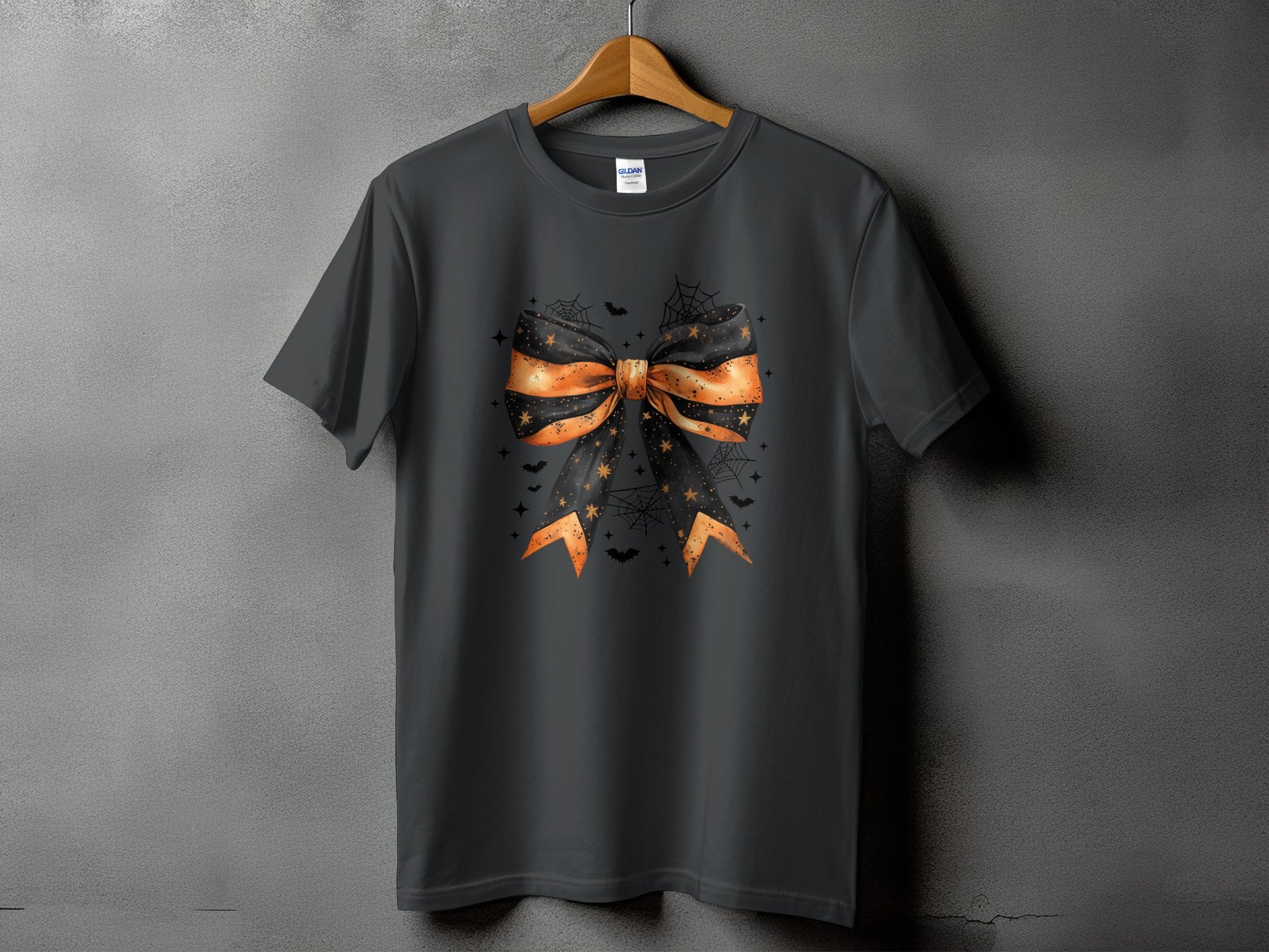 Dark grey t-shirt featuring a Halloween bow with bats and spiderwebs.