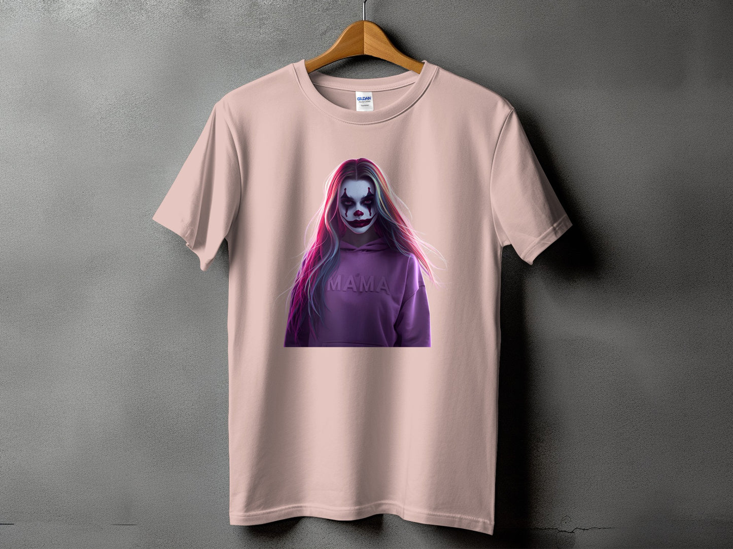 Pink t-shirt with a graphic of a person in clown makeup and a purple hoodie with "MAMA" on it.