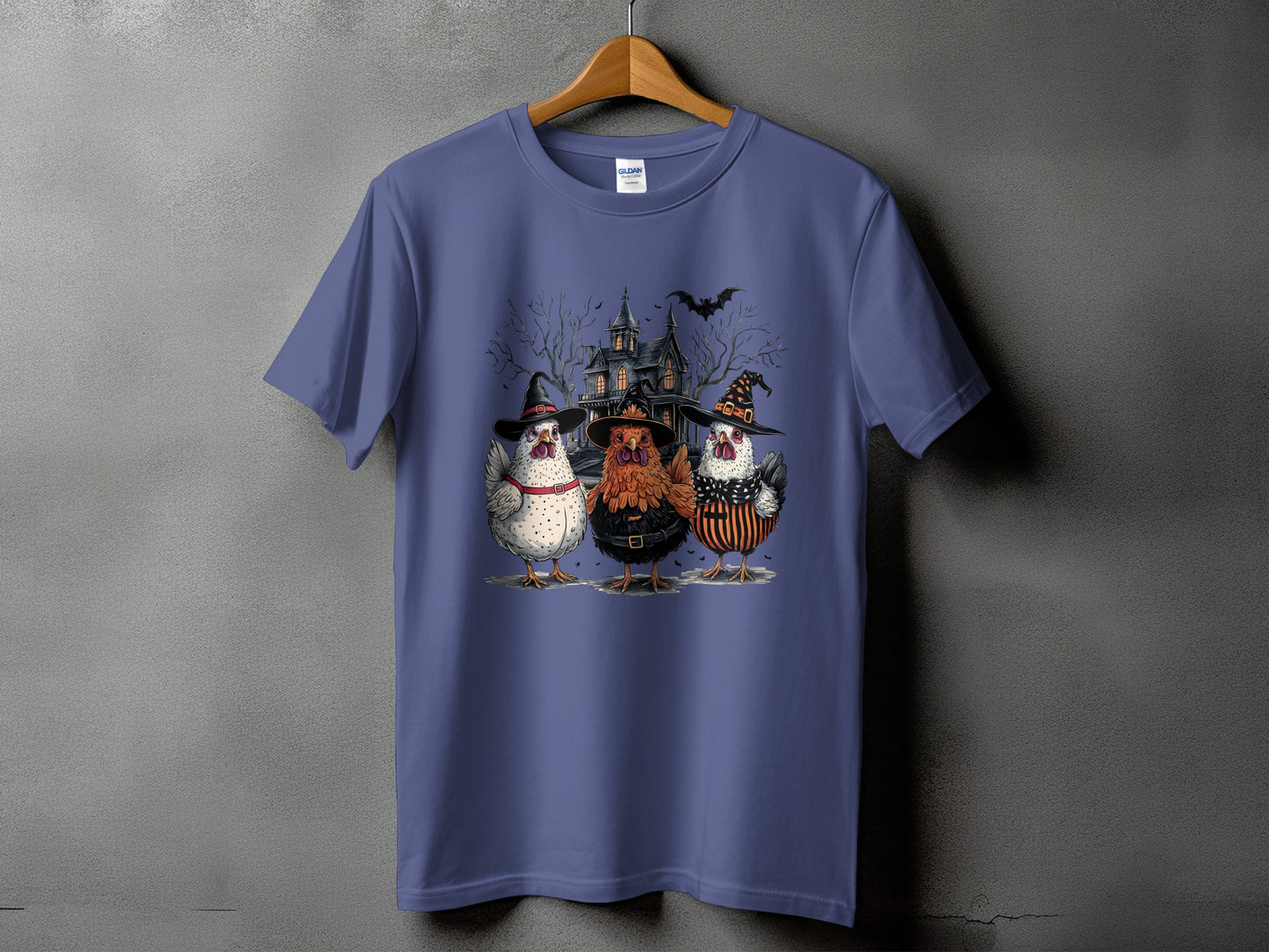 Three chickens dressed in Halloween costumes stand before a haunted house.