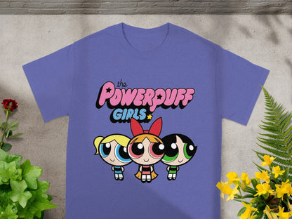 The Powerpuff Girls logo above three cartoon characters on a purple t-shirt.