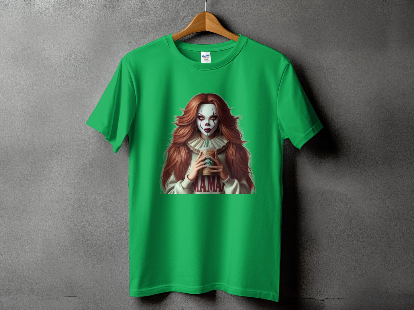 Green t-shirt with a clown illustration holding a coffee cup and the word "MAMA."