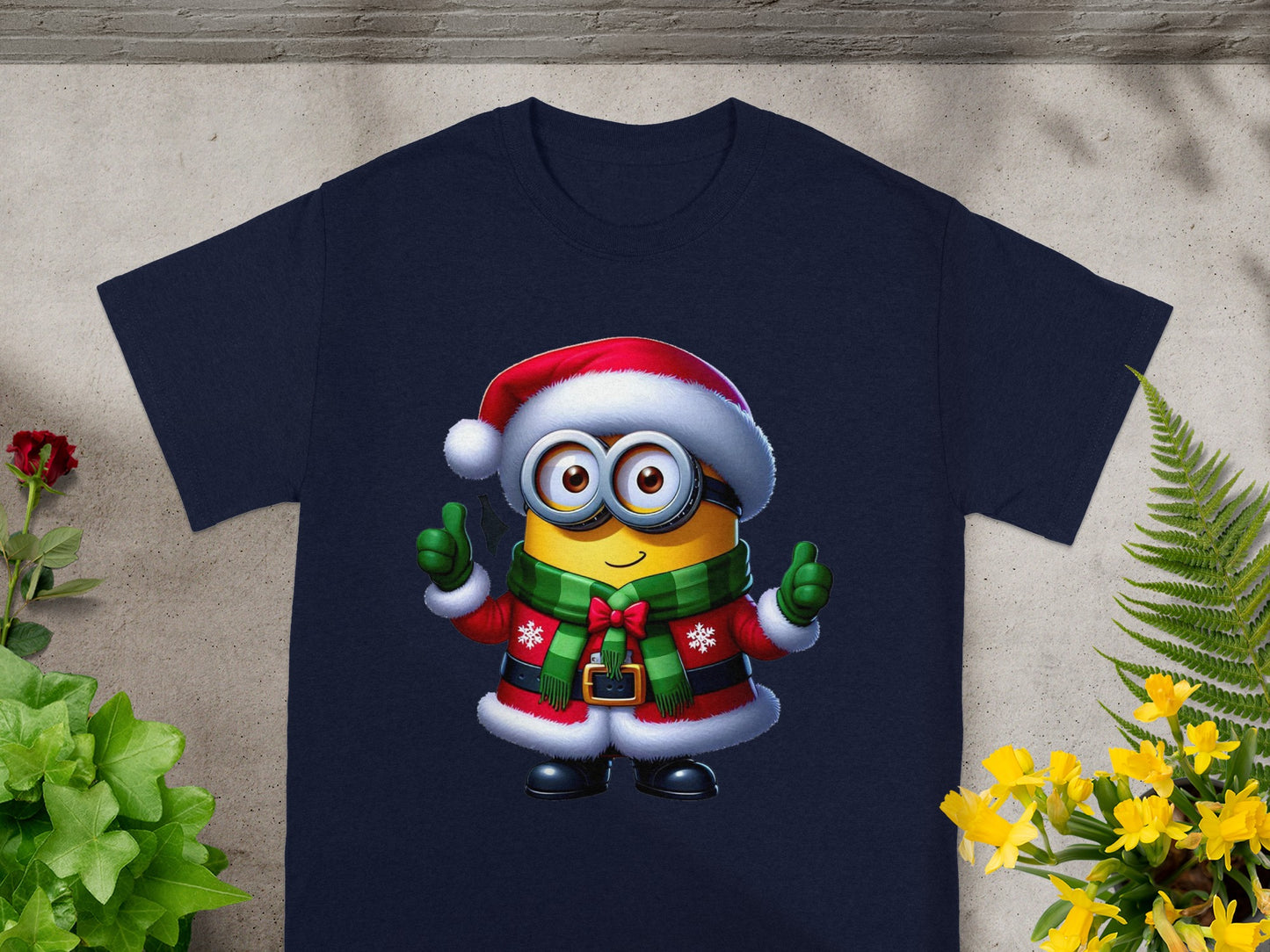 Navy t-shirt with a Minion wearing a Santa hat and Christmas coat, giving thumbs up.