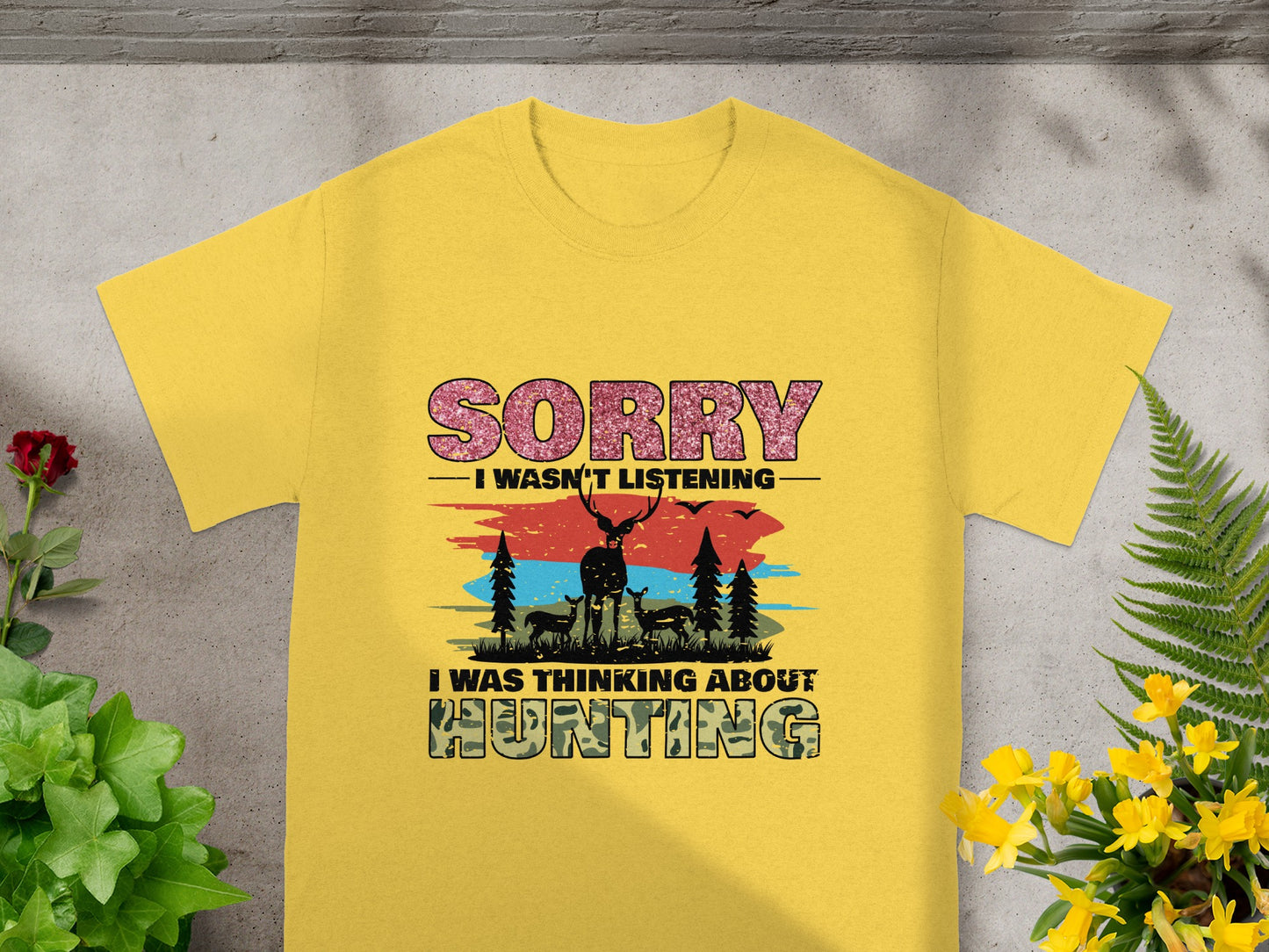 Yellow t-shirt with "SORRY I WASN'T LISTENING" and deer graphic.