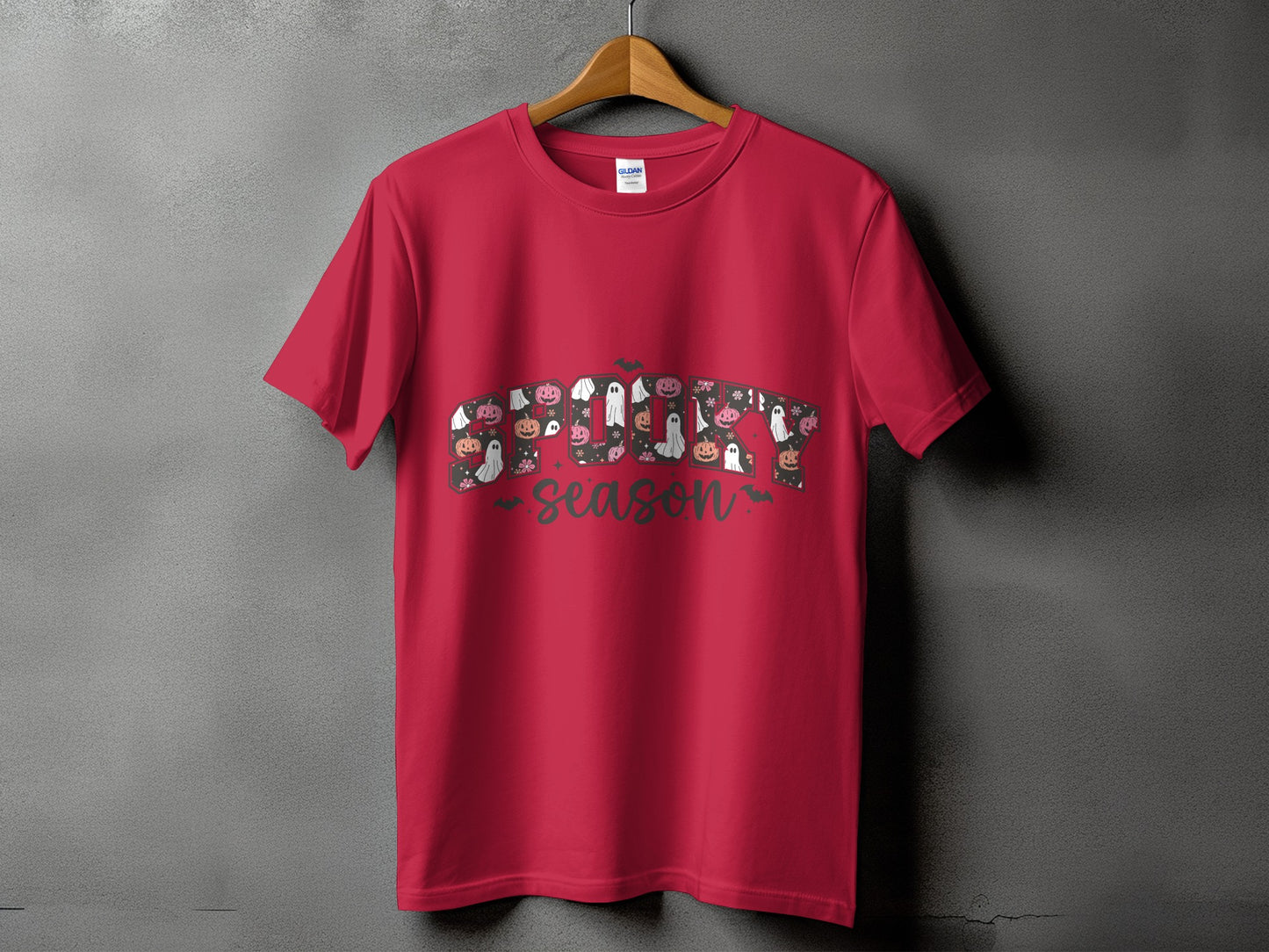 Red t-shirt with "Spooky Season" text featuring pumpkins and ghosts.