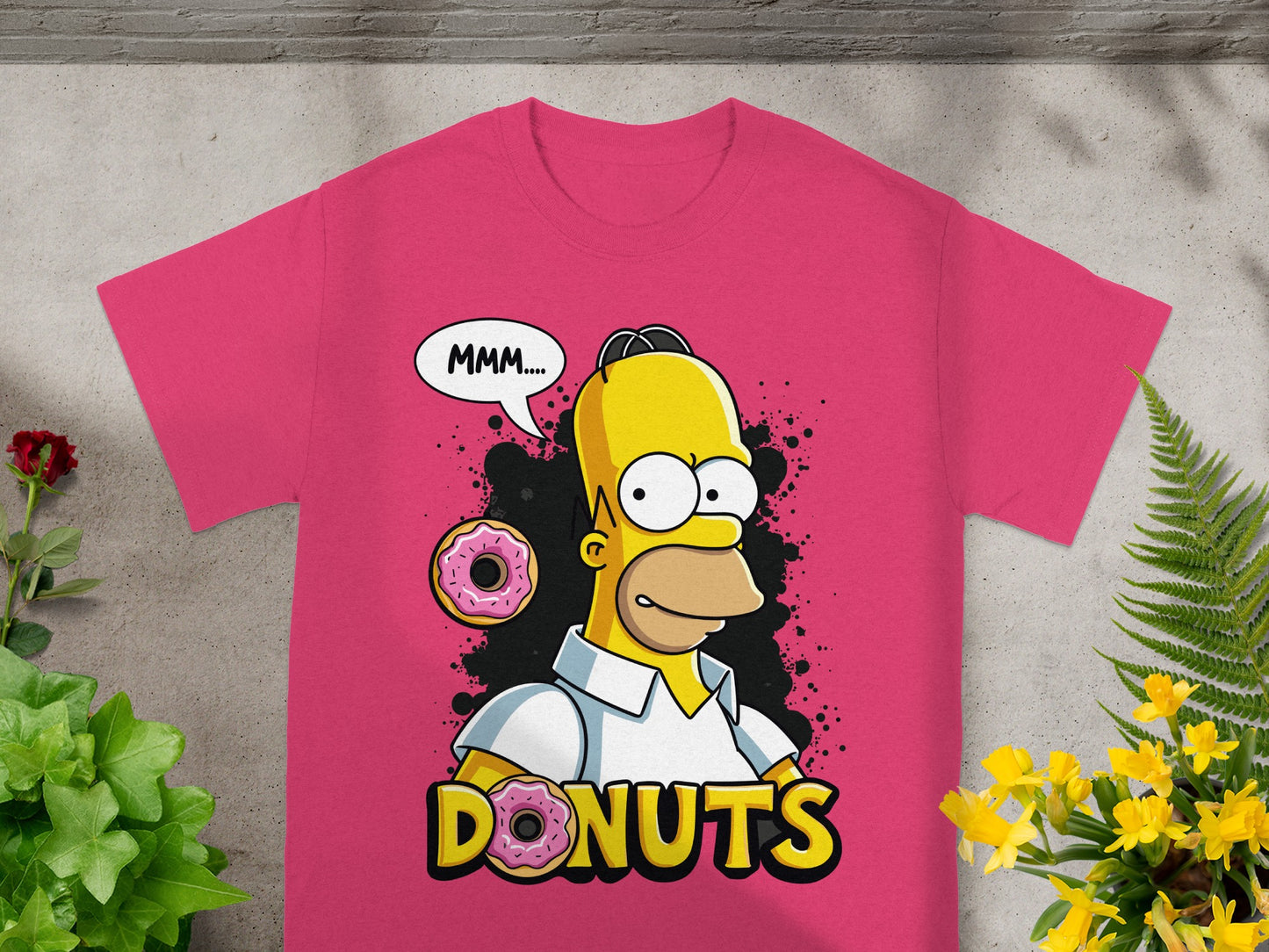 Homer Simpson in a pink shirt with "DONUTS" and a donut speech bubble.