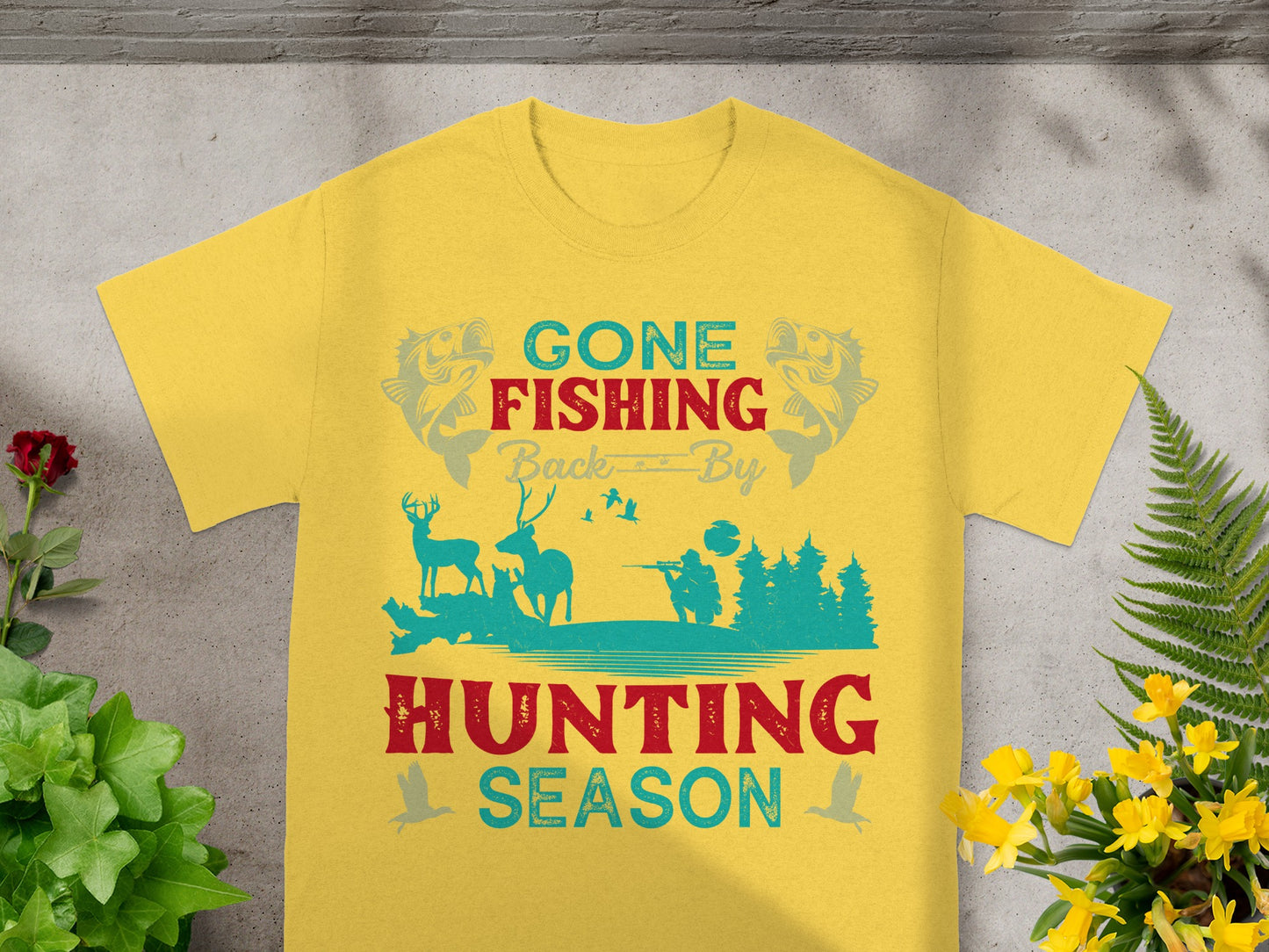 Yellow t-shirt with "Gone Fishing" and "Hunting Season" graphics depicting fishing and hunting scenes.