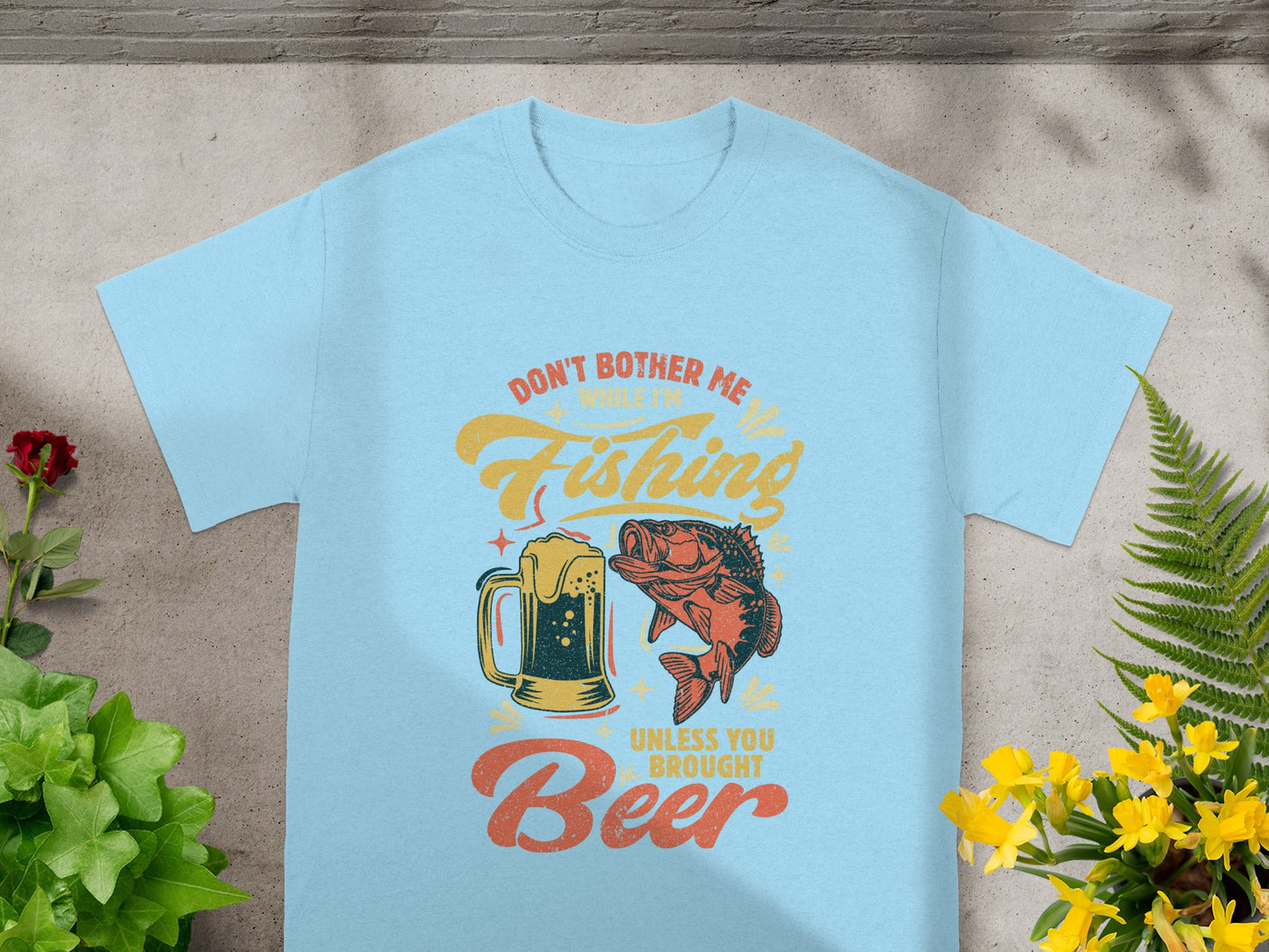 Light blue t-shirt with "Don't bother me while I'm fishing unless you brought beer" text.