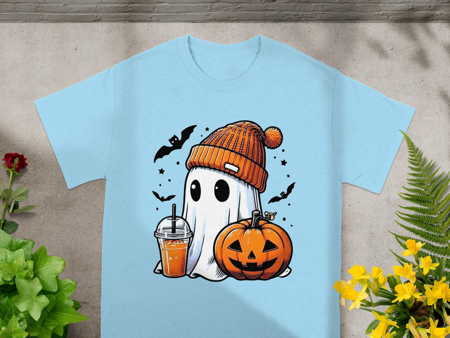 Ghost with pumpkin and drink, wearing an orange beanie, surrounded by bats and stars.