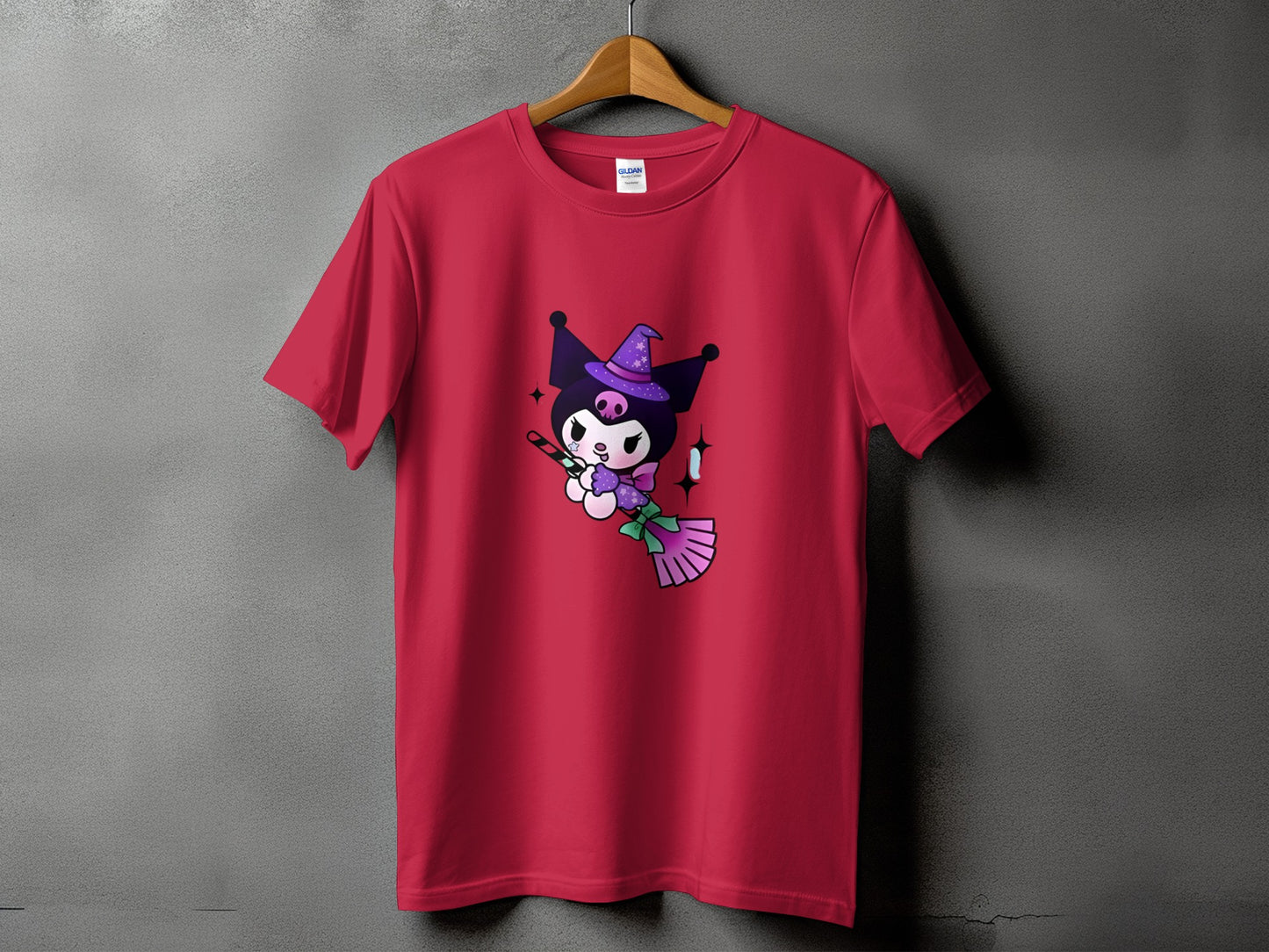 Red t-shirt with Kuromi character wearing witch hat and holding broom.