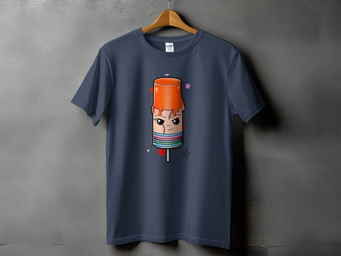 T-shirt with a cartoon popsicle character wearing stitched clothing and dripping orange glaze.