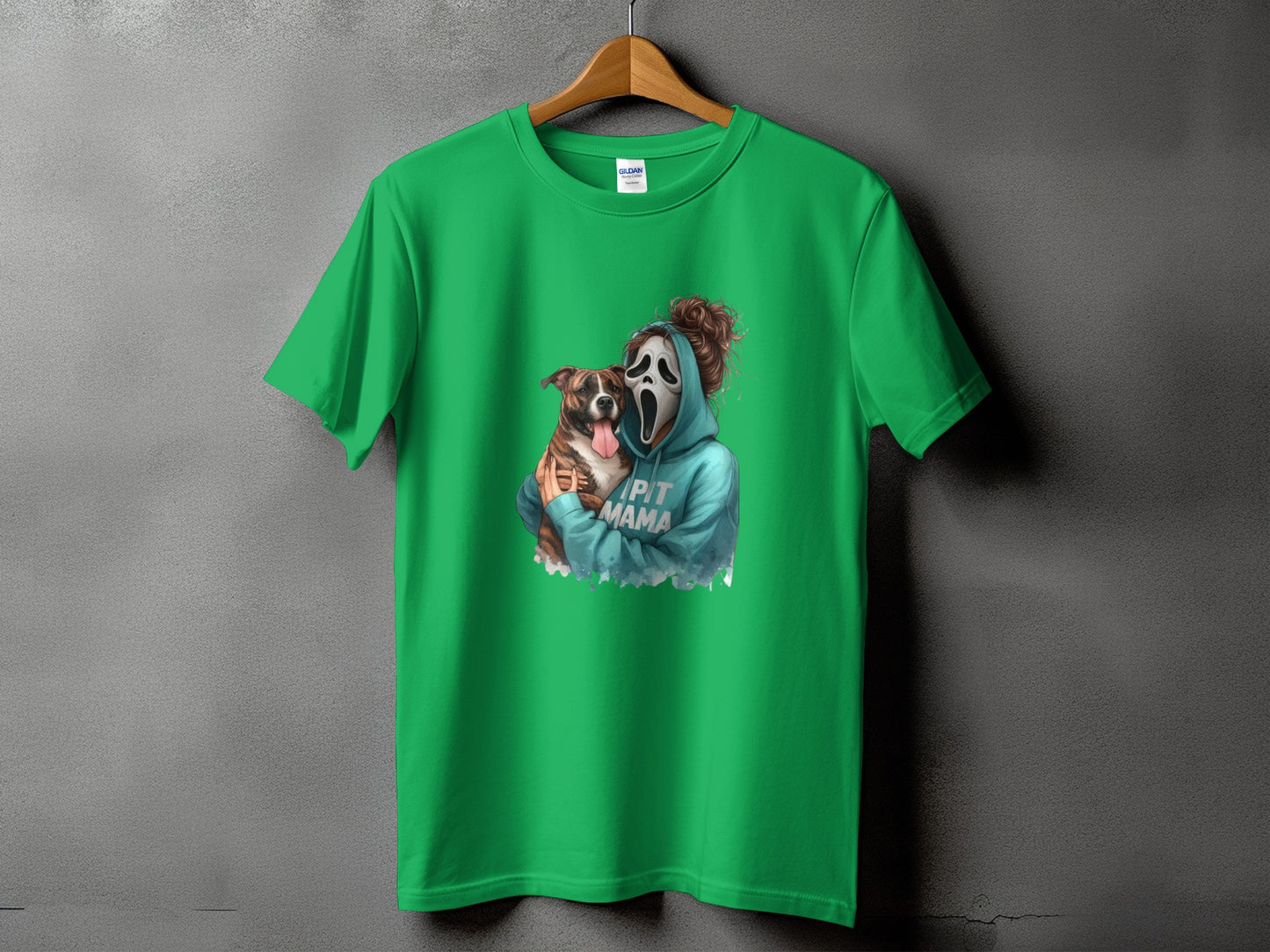 Green t-shirt with ghost mask and dog graphic that reads "PIT MAMA"