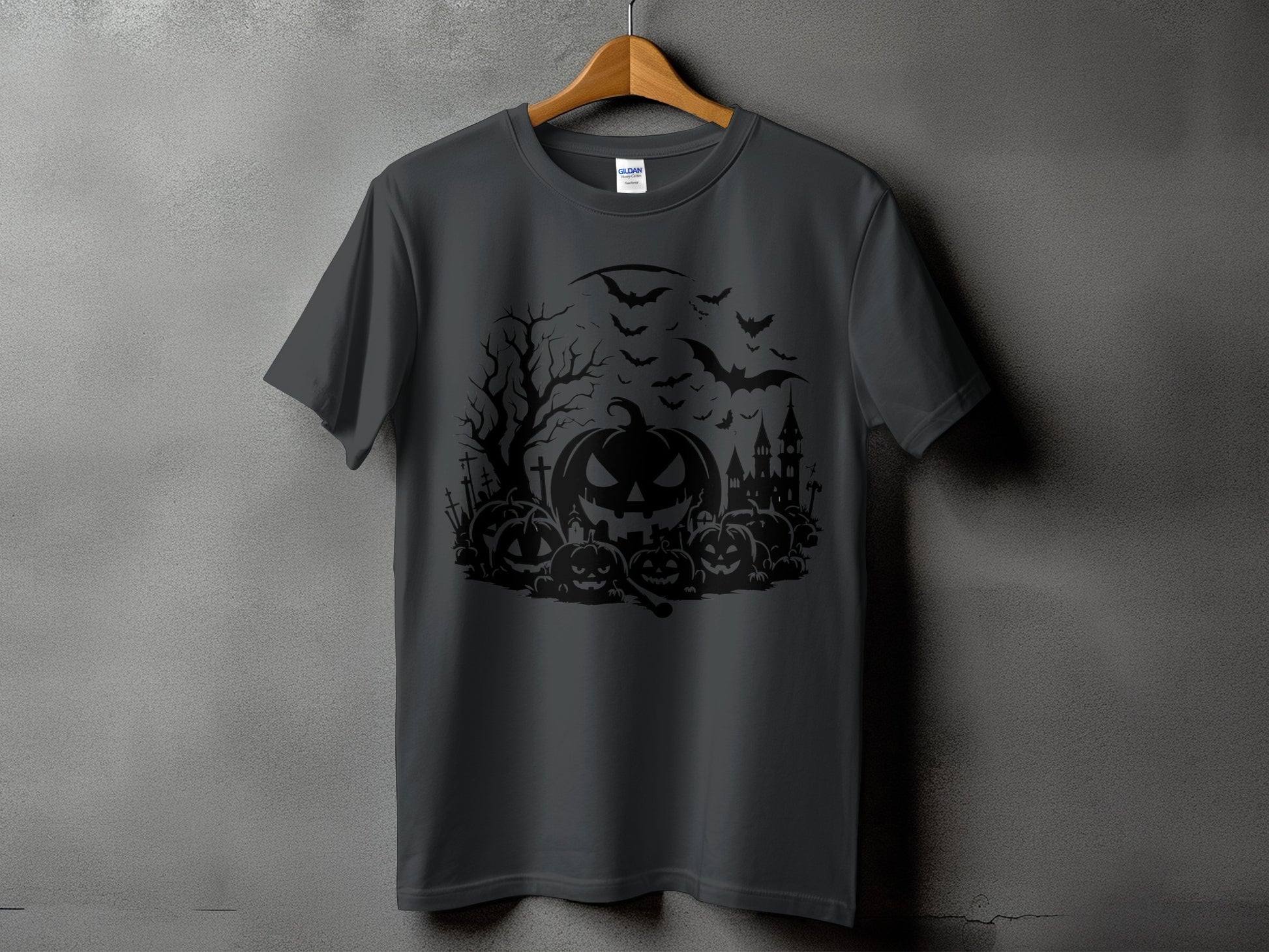 Dark gray t-shirt with black Halloween graphic of pumpkins, bats, and a haunted house.